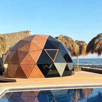 Tetra-Glass-Hybrid-Domes TheDomeHouse 6M-Glass-Dome-House-with-Wooden-Color-Solid-Panels-at-the-Seaside 1-1024x1024 x