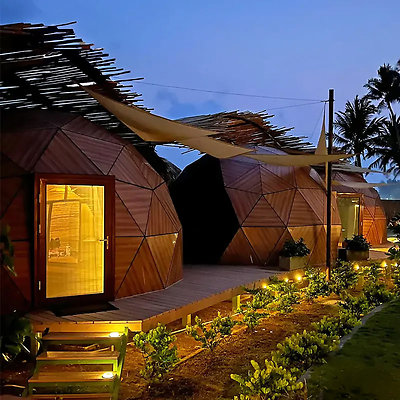 Tetra-Glass-Hybrid-Domes TheDomeHouse 6M-Glass-Dome-House-with-Wooden-Color-Solid-Panels-at-the-Seaside 4-1536x1536