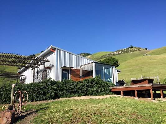 main-barn-and-side-deck-with-fire-pit
