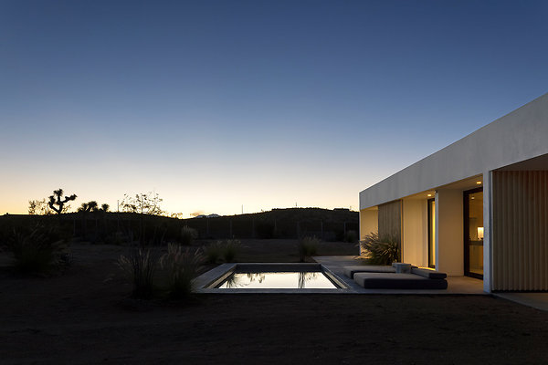 tera-haus house yucca-valley-ca-usa exterior-night-pool-1719877804408