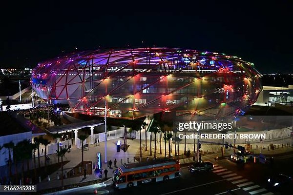 005 - The new Intuit Dome is illuminated on opening night in Inglewood, California, August 15, 2024. The Intuit Dome is an indoor arena, home of the Los Angeles Clippers of the National Basketball Association (NBA) and host venue for the 2028 Olympic Games. (Photo by Frederic J. Brown / AFP) (Photo by FREDERIC J. BROWN/AFP via Getty Images)